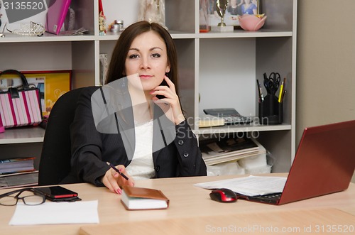 Image of Head girl at desk in the office