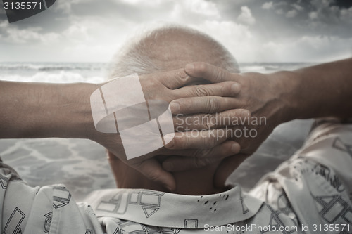 Image of Senior man at the sea