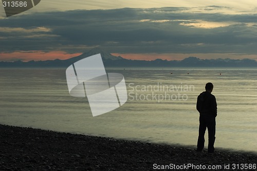 Image of Standing, watching, thinking