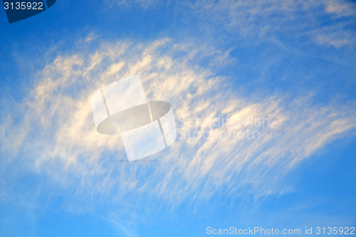 Image of in the blue sky white soft clouds and  background