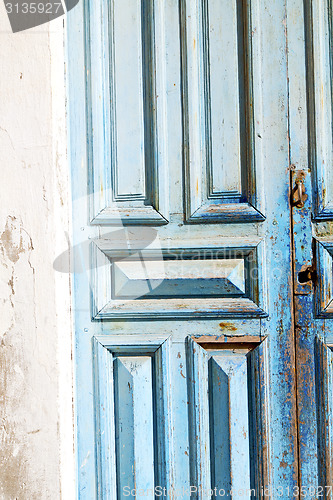 Image of morocco in africa  and rusty safe padlock 