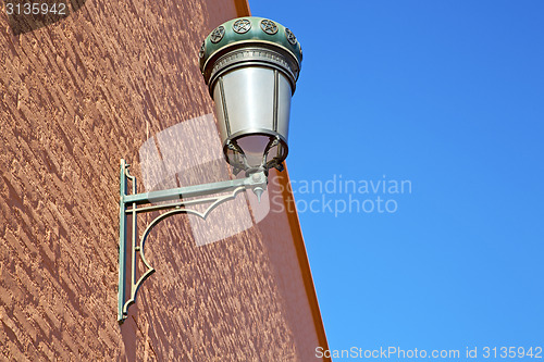 Image of  street lamp in morocco  and decoration  brick