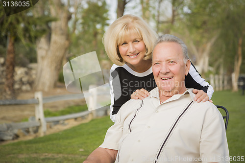 Image of Affectionate Senior Couple Portrait At The Park