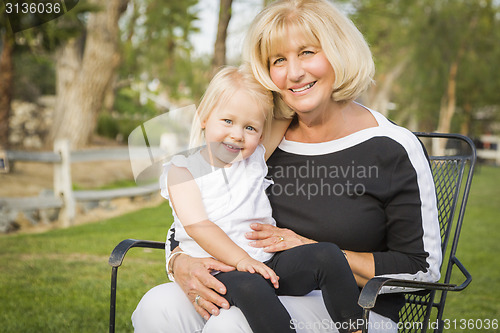 Image of Grandmother and Granddaughter Playing At The Park