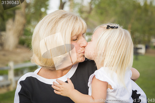 Image of Grandmother and Granddaughter Playing At The Park