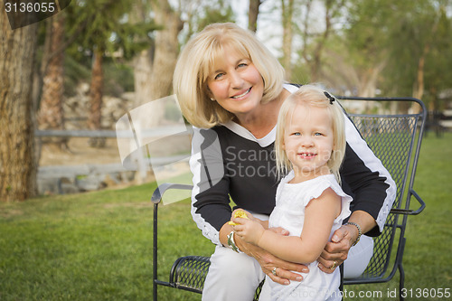 Image of Grandmother and Granddaughter Playing At The Park