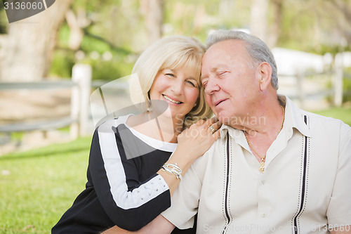 Image of Affectionate Senior Couple Portrait At The Park