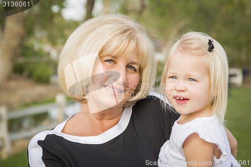 Image of Grandmother and Granddaughter Playing At The Park