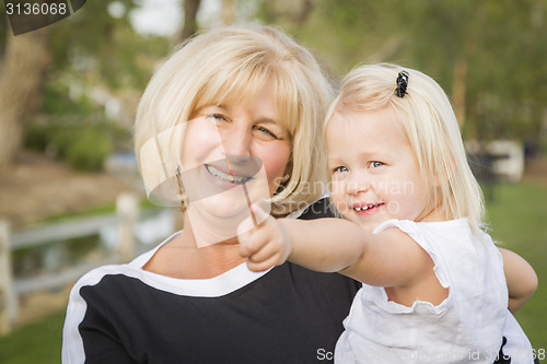 Image of Grandmother and Granddaughter Playing At The Park