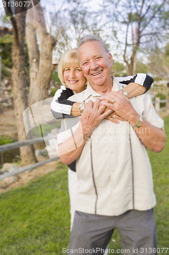 Image of Affectionate Senior Couple Portrait At The Park