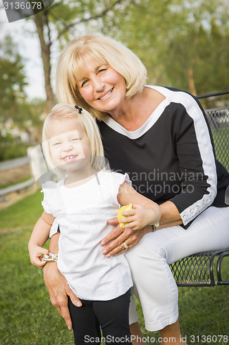 Image of Grandmother and Granddaughter Playing At The Park