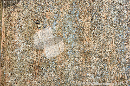 Image of weathered old paint on wood surface