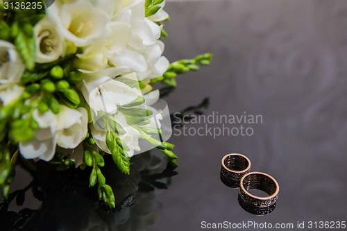 Image of Two wedding rings in infinity sign. Love concept.