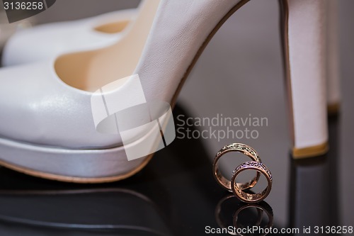 Image of Two wedding rings in infinity sign. Love concept.