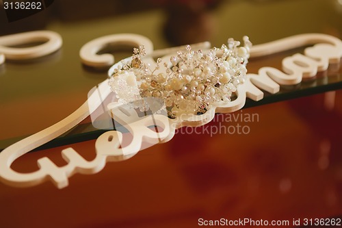 Image of composition of wedding accessories bride