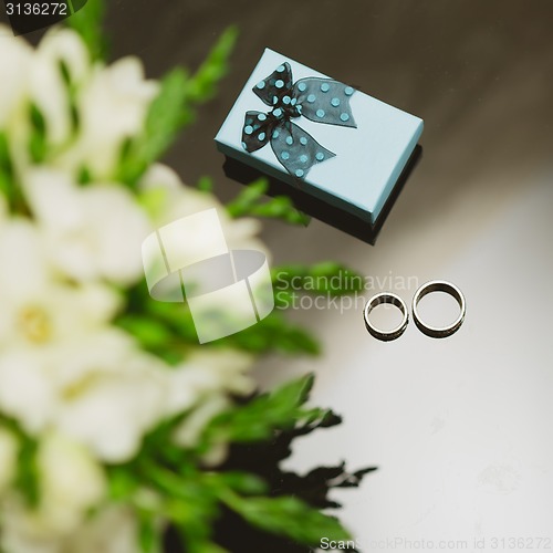 Image of Two wedding rings in infinity sign. Love concept.