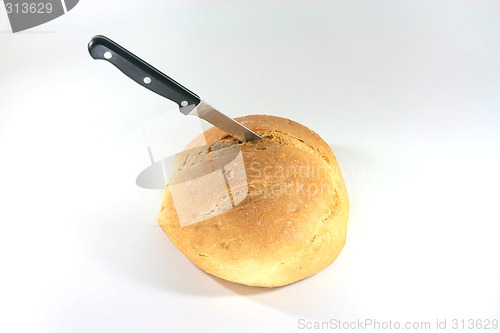 Image of loaf with knife
