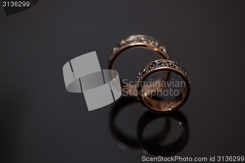 Image of Two wedding rings in infinity sign. Love concept.