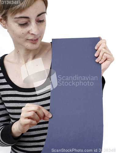 Image of Woman holding a paper