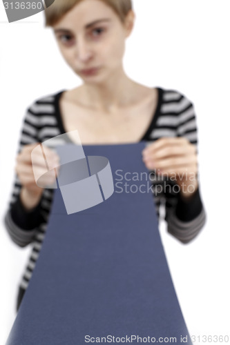 Image of Woman holding a paper