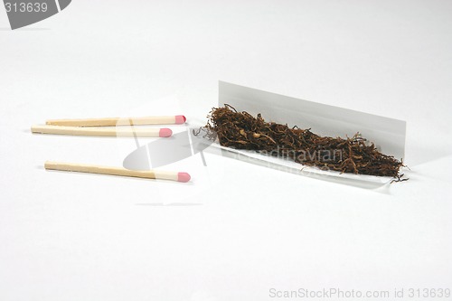 Image of rolling cigarette
