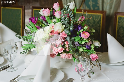 Image of Beautiful flowers on table