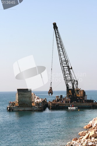 Image of floating crane in action