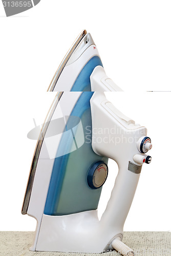 Image of Electric iron on a white background.