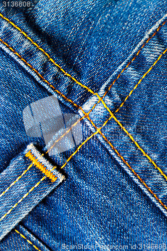 Image of blue old jeans seams