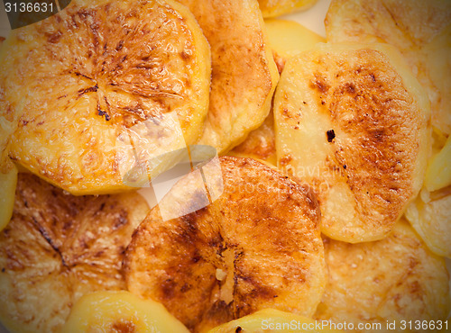 Image of slices of baked potatoes