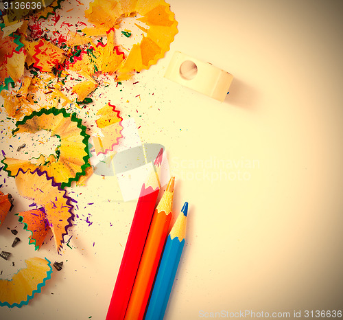 Image of colored pencil, shavings and sharpener