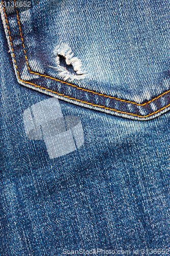 Image of jeans pocket with hole