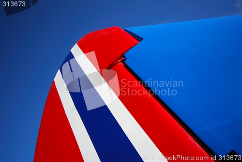 Image of Red white and blue tail rudder.