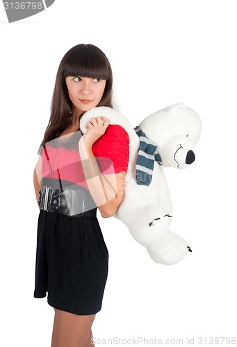 Image of Pretty girl with bear toy