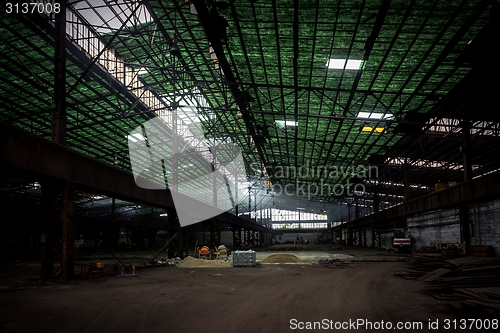 Image of Large industrial hall with low light