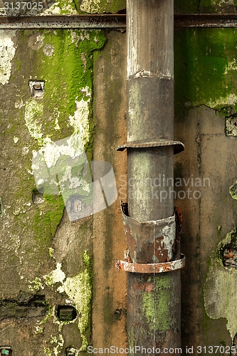 Image of Old pipes on wall