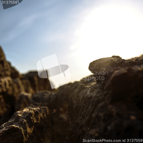 Image of Closeup photo of rocks on the shore