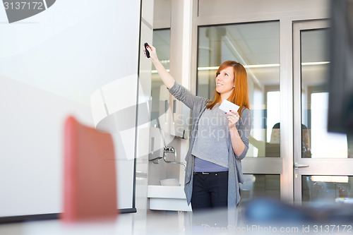 Image of Businesswoman giving a talk.