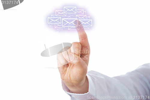 Image of Touching A Swarm Of Email Icons Forming A Cloud