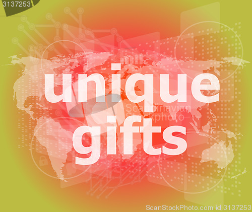Image of unique gifts text on digital touch screen - holiday concept