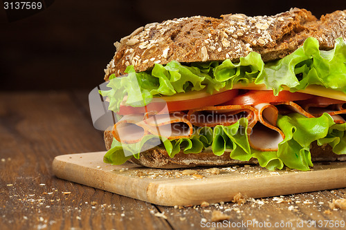 Image of Sandwich on the wooden table