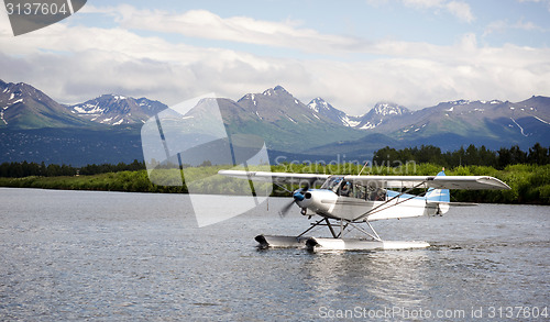 Image of Single Prop Airplane Pontoon PLane Water Landing Alaska Last Fro