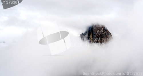 Image of Clouds and Fog Move in Covering Half Dome Yosemite