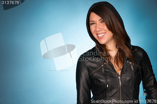 Image of Hip Smiling Young Adult Woman Wearing Leather Jacket Hooded Swea