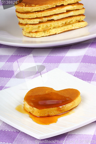 Image of Mini heart-shaped pancake with syrup