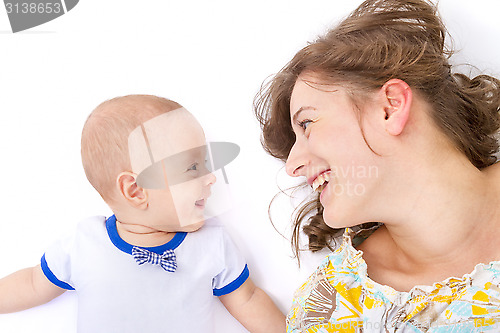 Image of mother talks with her baby boy 