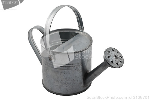 Image of miniature tin watering can on white