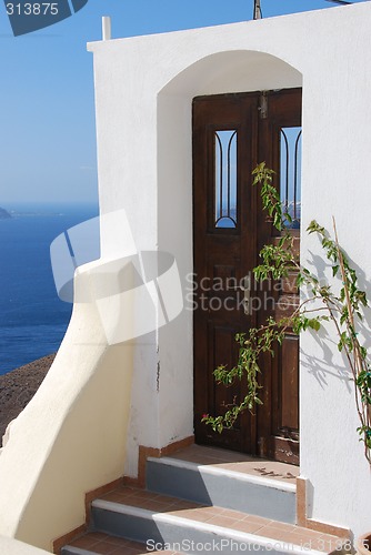 Image of Brown Door Blue Sky