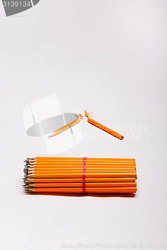 Image of yellow pencils and a broken pencil