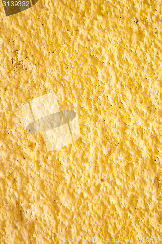Image of yellow  in texture wall  